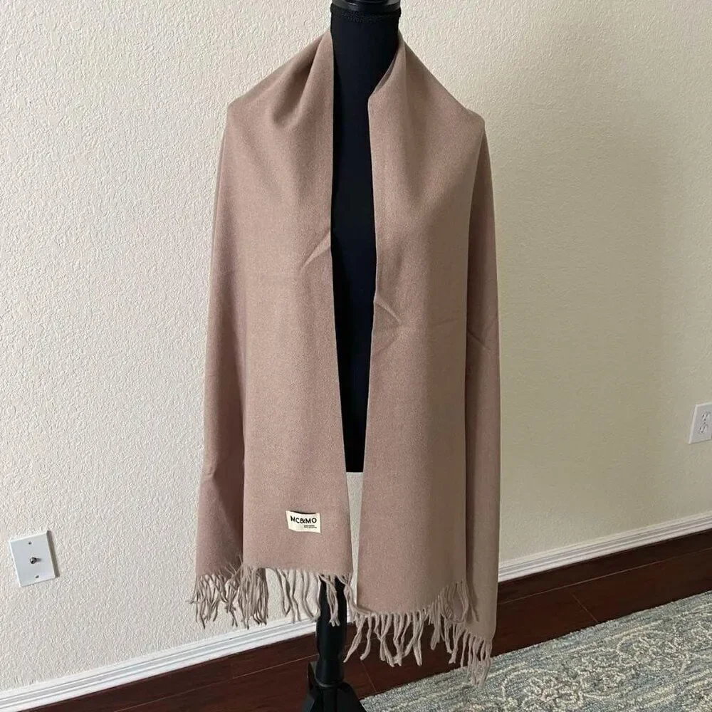 Brown Soft warm scarf is a mixture of polyester and viscose condition is new